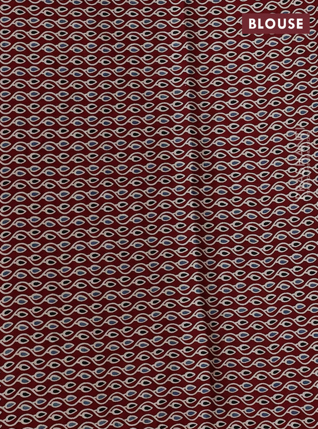 Modal silk saree pastel green and maroon with allover bandhani butta prints and ajrakh printed pallu & Blouse