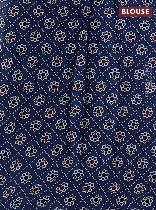 Modal silk saree pastel green and peacock blue with allover bandhani butta prints and ajrakh printed pallu & Blouse