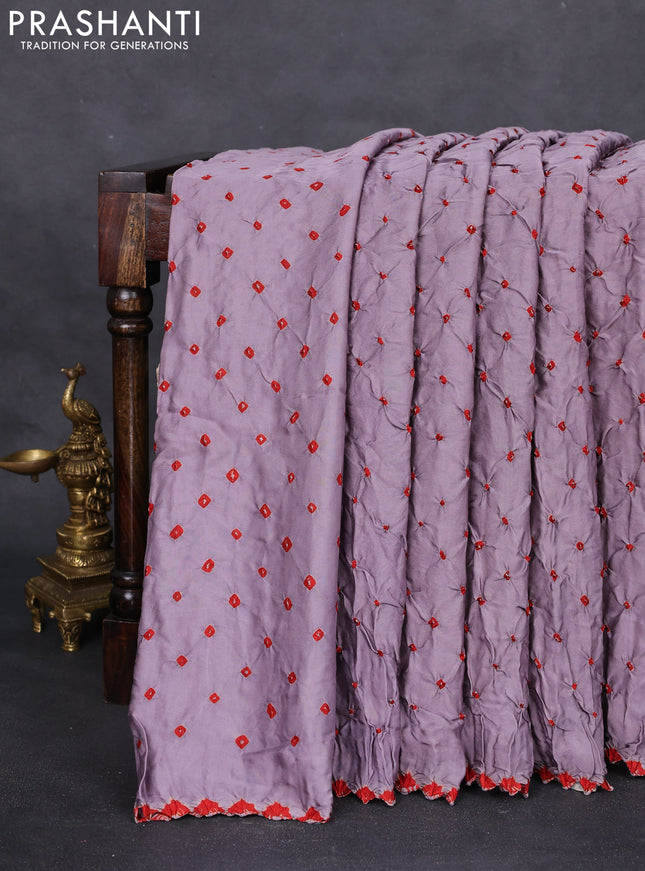 Modal silk saree lavender and peacock blue with allover bandhani butta prints and ajrakh printed pallu & Blouse