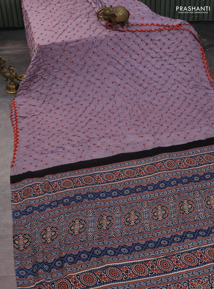 Modal silk saree lavender and peacock blue with allover bandhani butta prints and ajrakh printed pallu & Blouse