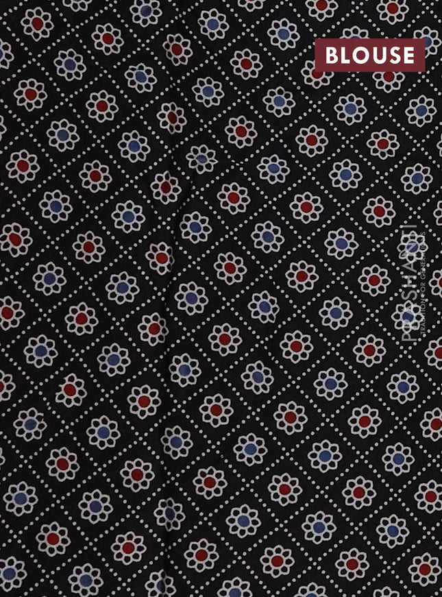 Modal silk saree peach orange and black with allover bandhani butta prints and ajrakh printed pallu & Blouse