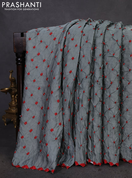 Modal silk saree grey and blue with allover bandhani butta prints and ajrakh printed pallu & Blouse