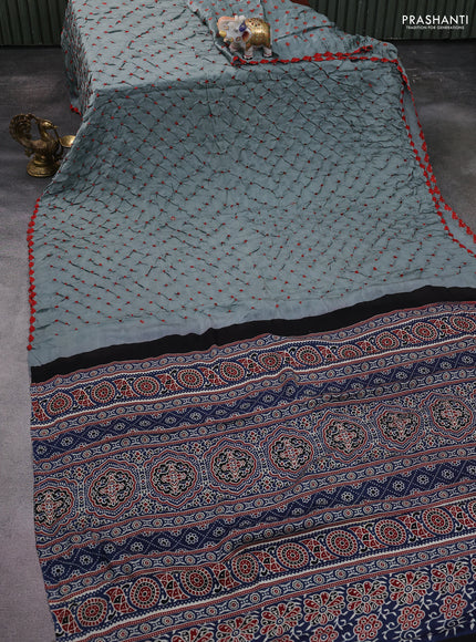 Modal silk saree grey and blue with allover bandhani butta prints and ajrakh printed pallu & Blouse