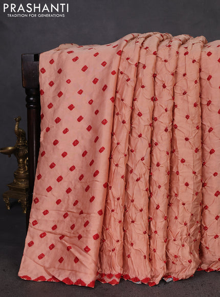 Modal silk saree peach orange and blue with allover bandhani butta prints and ajrakh printed pallu & Blouse