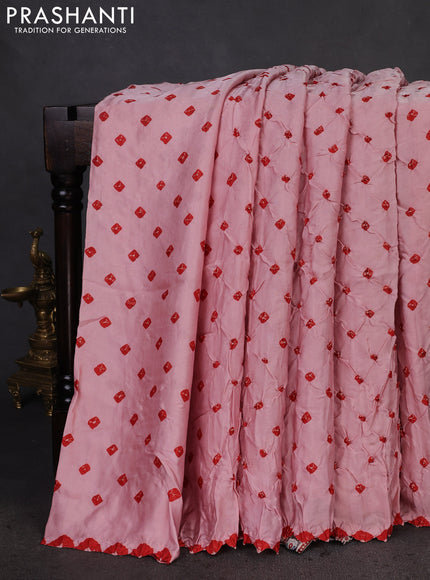 Modal silk saree peach pink and black with allover bandhani butta prints and ajrakh printed pallu & Blouse