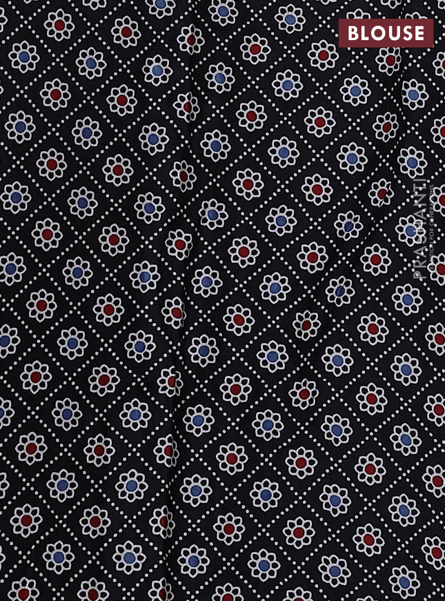 Modal silk saree peach pink and black with allover bandhani butta prints and ajrakh printed pallu & Blouse