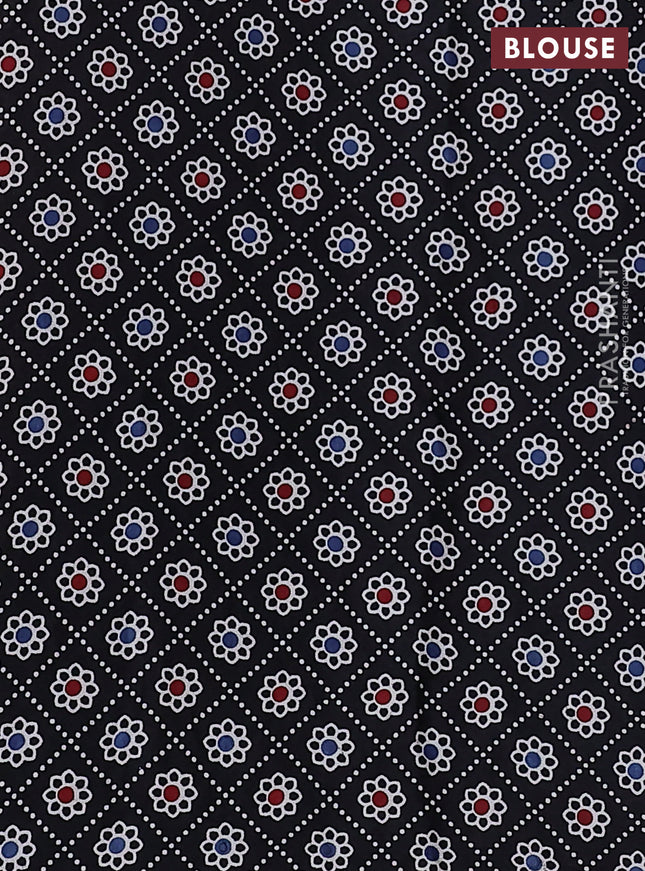 Modal silk saree peach pink and black with allover bandhani butta prints and ajrakh printed pallu & Blouse