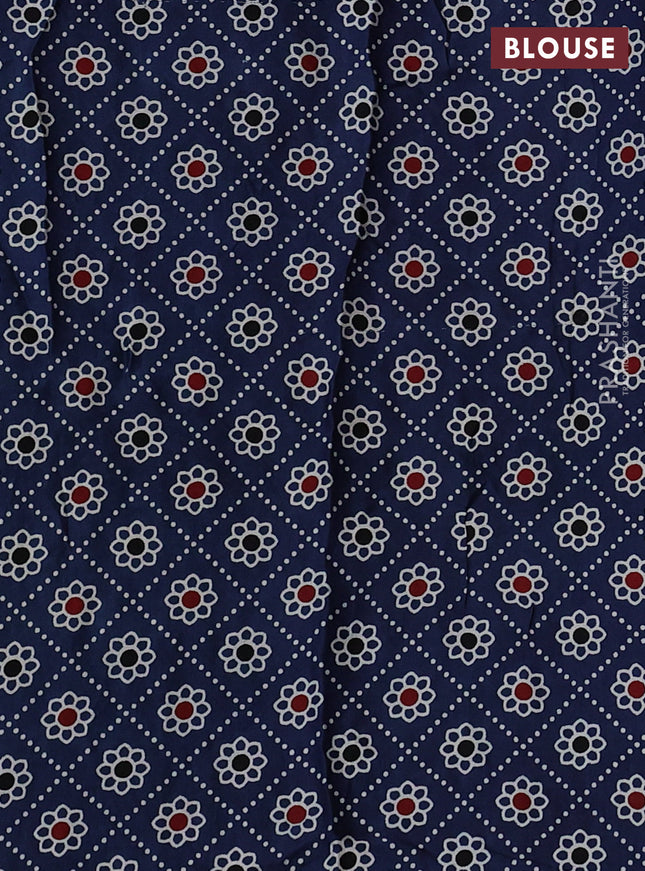 Modal silk saree peach shade and peacock blue with allover bandhani butta prints and ajrakh printed pallu & Blouse