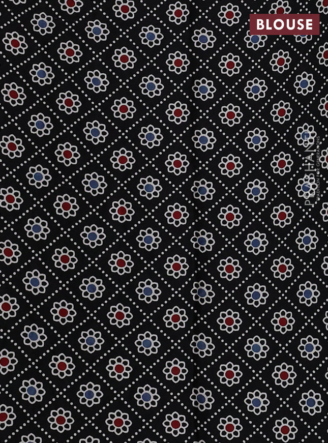 Modal silk saree pista green and black with allover bandhani butta prints and ajrakh printed pallu & Blouse