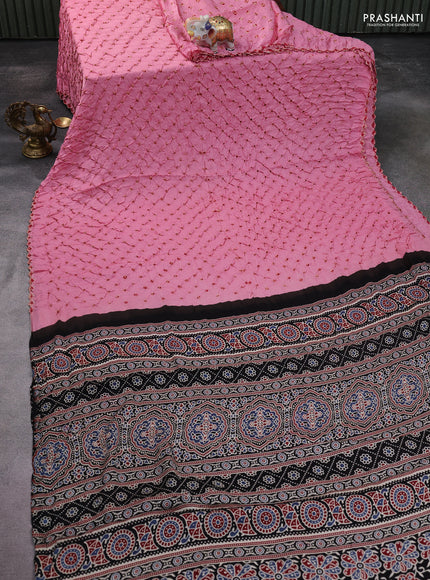 Modal silk saree peach pink and black with allover bandhani butta prints and ajrakh printed pallu & Blouse