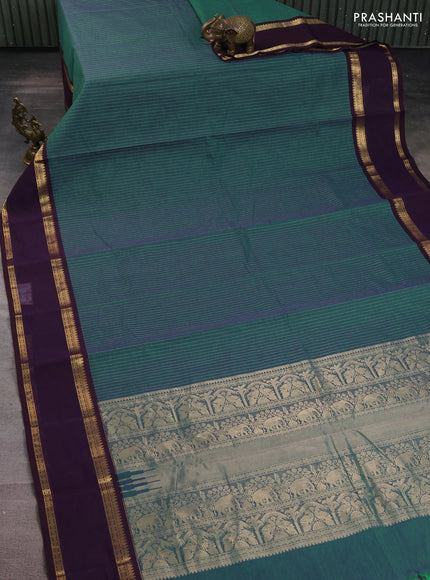 Kanchi cotton saree dual shade of teal green and wine shade with allover zari stripe pattern and rettapet zari woven border
