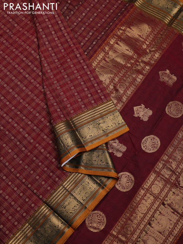 Kanchi cotton saree maroon and dark mustard with allover thread checked pattern & buttas and zari woven border