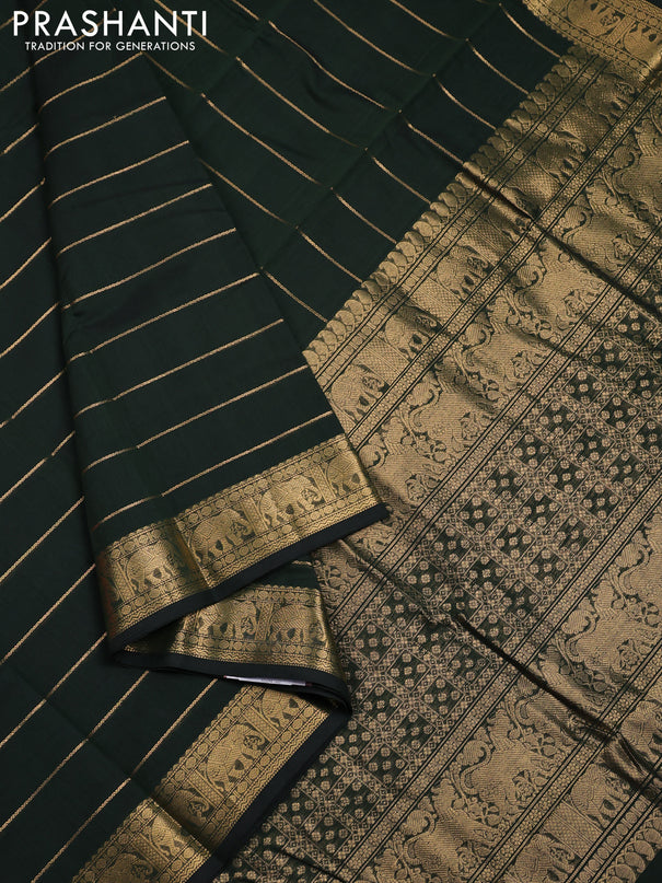 Kanchi cotton saree bottle green with allover zari stripe pattern and elephant zari woven border