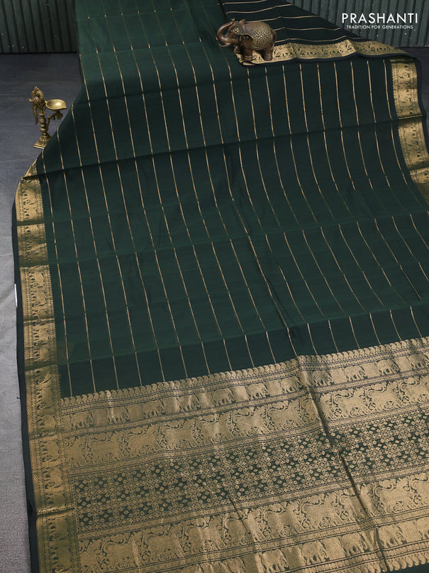 Kanchi cotton saree bottle green with allover zari stripe pattern and elephant zari woven border