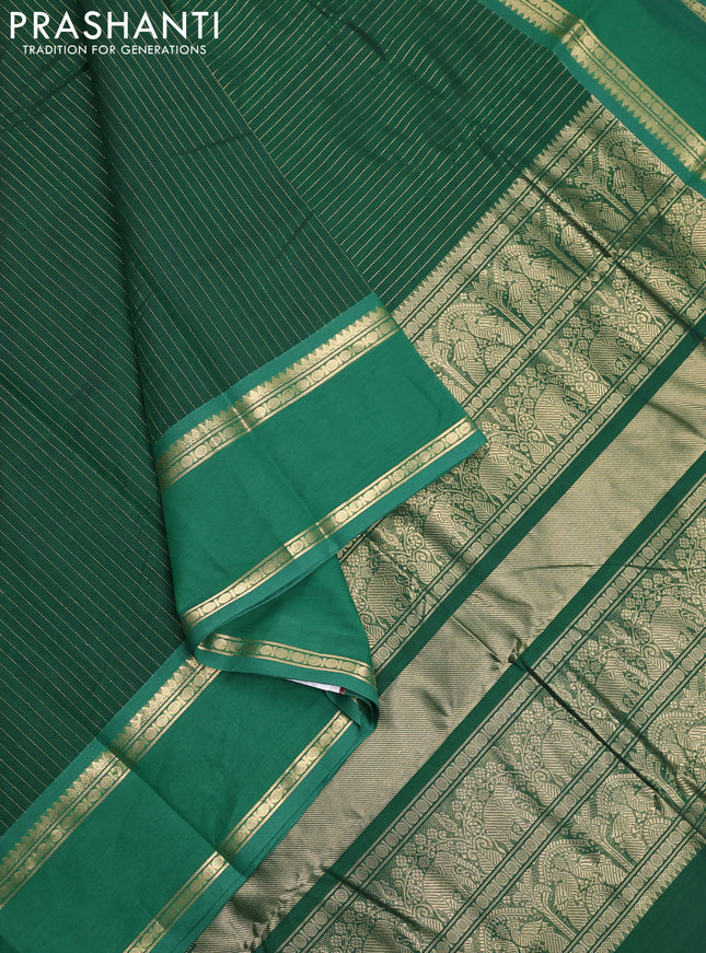 Kanchi cotton saree green with allover zari stripe pattern and rettapet zari woven border