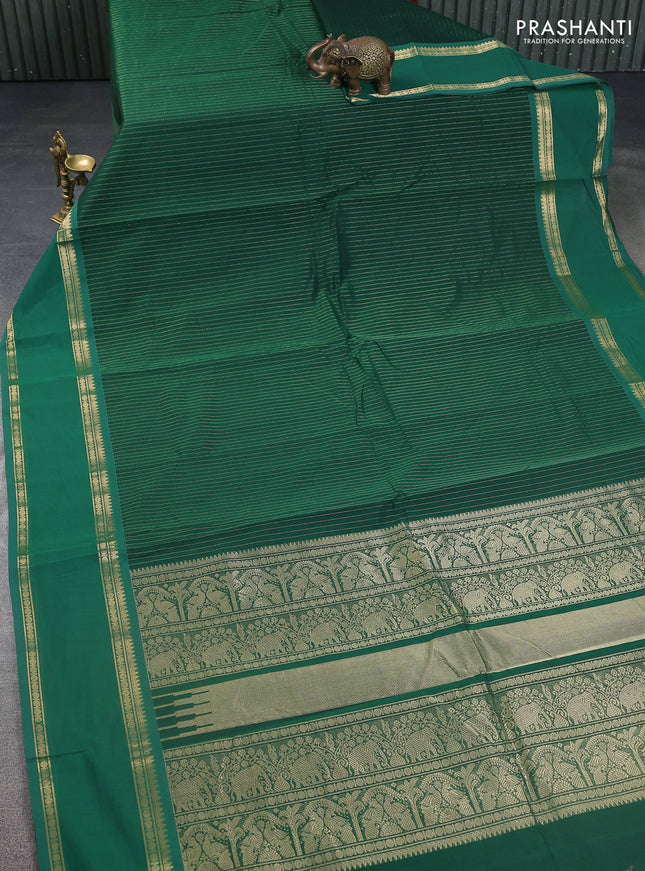 Kanchi cotton saree green with allover zari stripe pattern and rettapet zari woven border