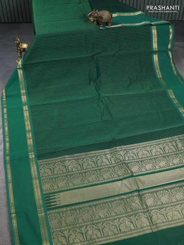 Kanchi cotton saree green with allover zari stripe pattern and rettapet zari woven border
