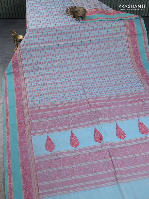 Kanchi cotton saree pastel blue with allover checked pattern & buttas and thread woven border