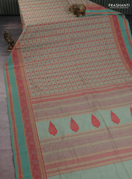 Kanchi cotton saree pastel green with allover checked pattern & buttas and rettapet thread woven border