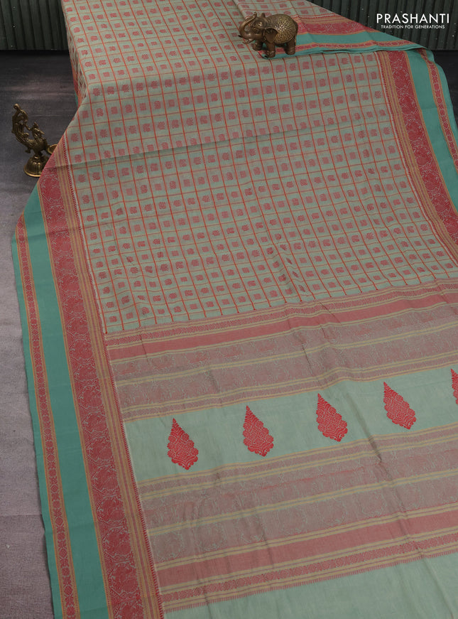 Kanchi cotton saree pastel green with allover checked pattern & buttas and rettapet thread woven border