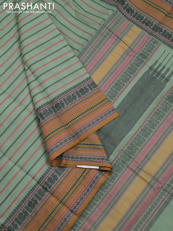 Kanchi cotton saree pastel green and dark mustard with allover thread woven stripes pattern and thread woven border
