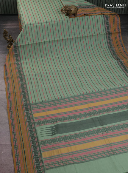 Kanchi cotton saree pastel green and dark mustard with allover thread woven stripes pattern and thread woven border