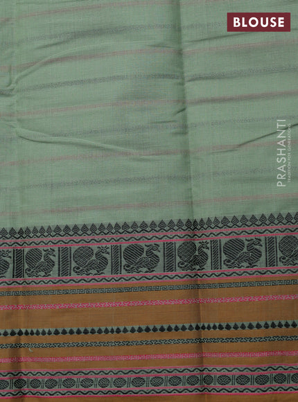 Kanchi cotton saree pastel green and dark mustard with allover thread woven stripes pattern and thread woven border