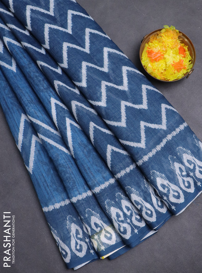 Semi linen saree blue and peacock blue with allover ikat prints and printed border