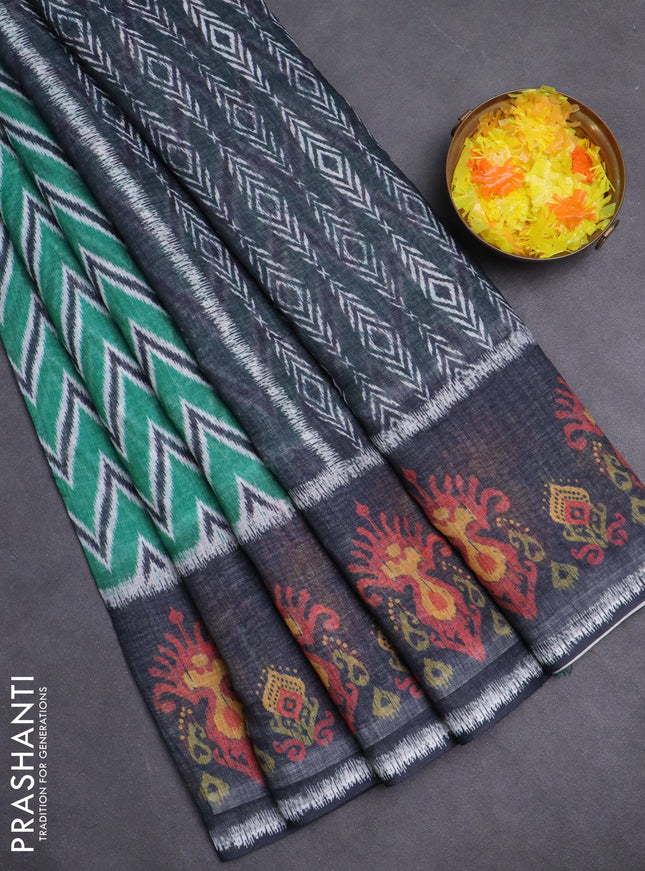 Semi linen saree teal green and elephant grey with allover zig zag ikat prints and long printed border