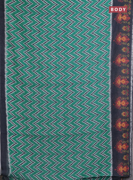 Semi linen saree teal green and elephant grey with allover zig zag ikat prints and long printed border