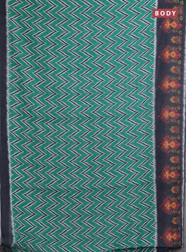 Semi linen saree teal green and elephant grey with allover zig zag ikat prints and long printed border