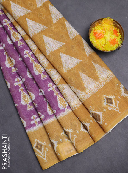 Semi linen saree purple and dark mustard with allover ikat prints and long printed border