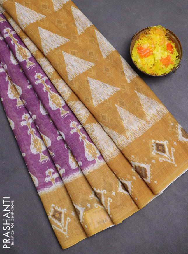 Semi linen saree purple and dark mustard with allover ikat prints and long printed border