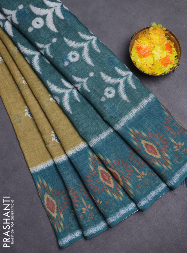 Semi linen saree mehendi green and peacock green with allover ikat butta prints and long printed border