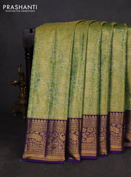 Kanchipuram tissue silk saree light green and blue with allover zari woven brocade weaves and zari woven border
