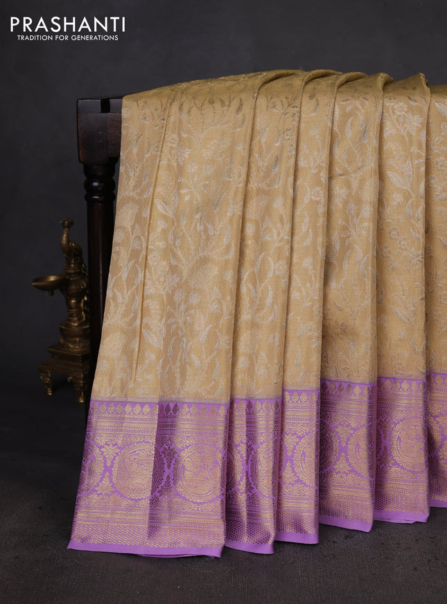 Kanchipuram silk saree sandal and lavender with allover zari woven brocade weaves and zari woven border