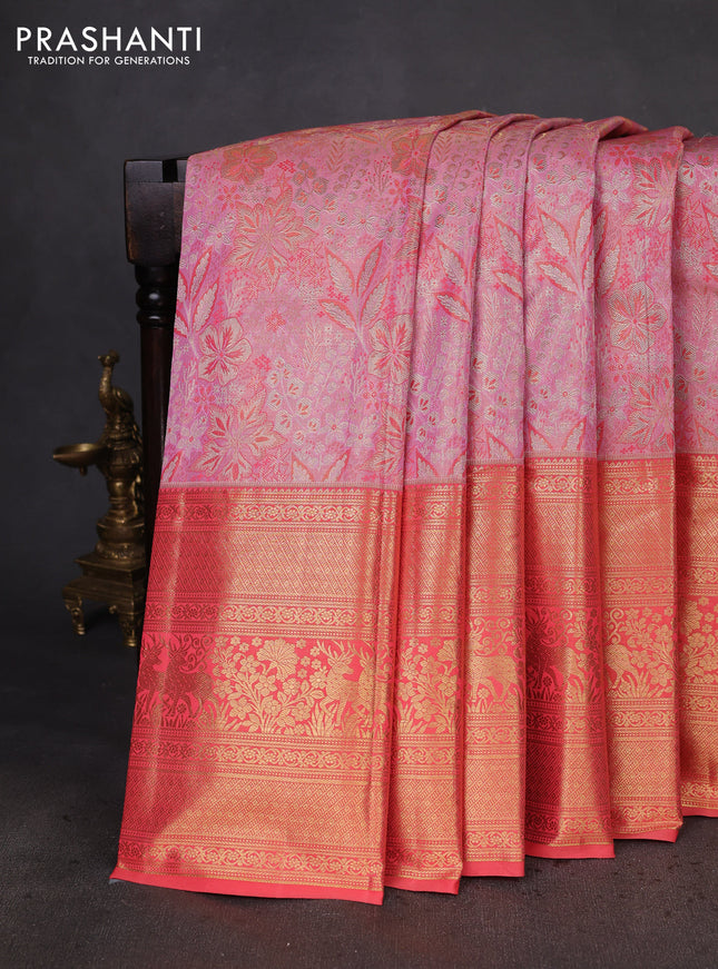 Kanchipuram silk saree light pink and peach orange with allover zari woven brocade weaves and zari woven border