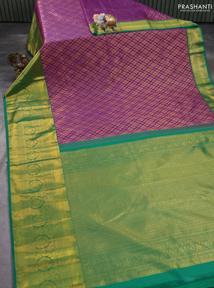 Kanchipuram silk saree purple and green with allover zari woven brocade weaves and zari woven border