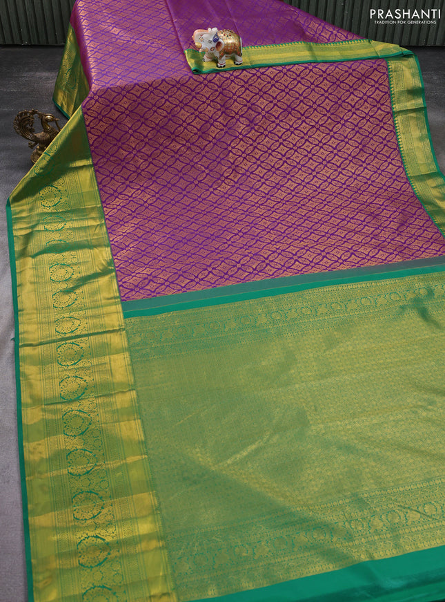 Kanchipuram silk saree purple and green with allover zari woven brocade weaves and zari woven border