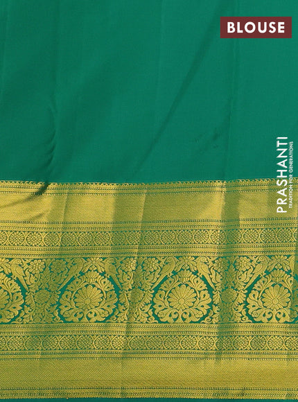 Kanchipuram silk saree purple and green with allover zari woven brocade weaves and zari woven border