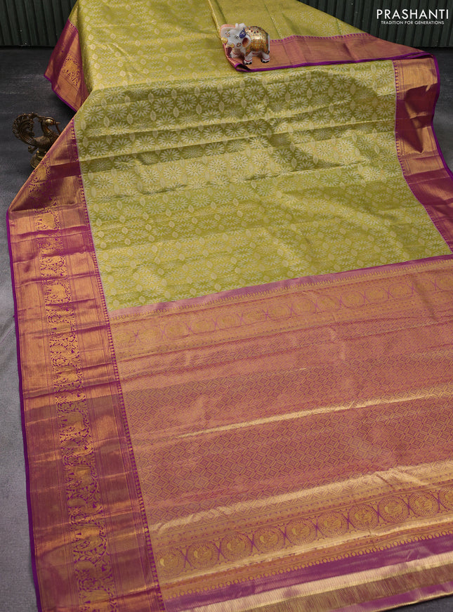 Kanchipuram tissue silk saree mehendi green and purple with allover zari woven brocade weaves and zari woven border