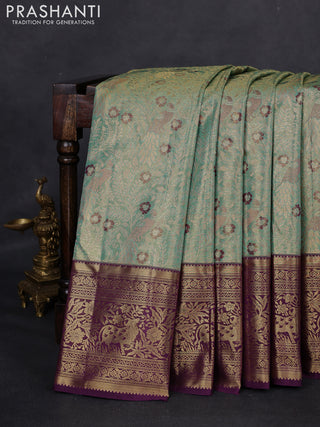 Kanchipuram tissue silk saree teal and wine shade with allover zari woven brocade weaves and zari woven border