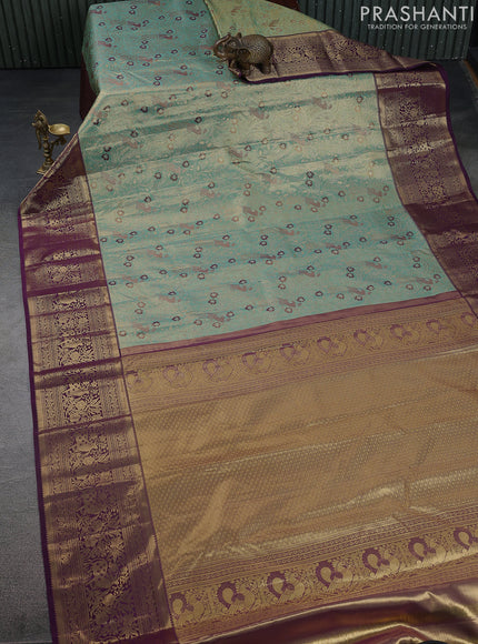Kanchipuram tissue silk saree teal and wine shade with allover zari woven brocade weaves and zari woven border