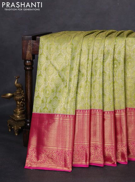 Kanchipuram tissue silk saree lime green and pink with allover zari woven brocade weaves and zari woven border