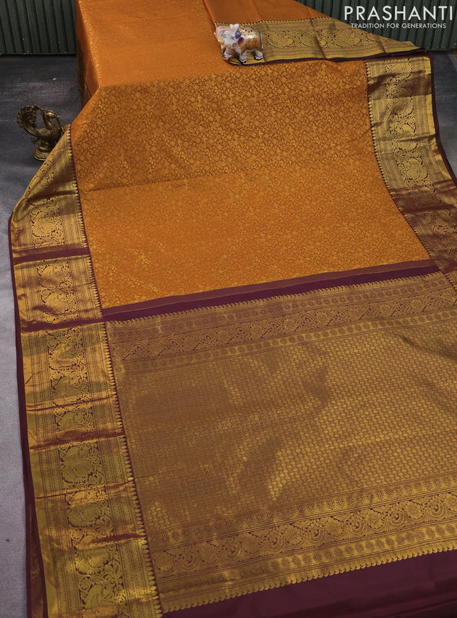 Kanchipuram silk saree rustic orange and deep maroon with allover zari woven brocade weaves and zari woven border