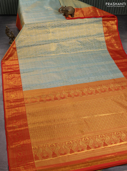 Kanchipuram tissue silk saree pastel blue and red with allover zari woven brocade weaves and zari woven border