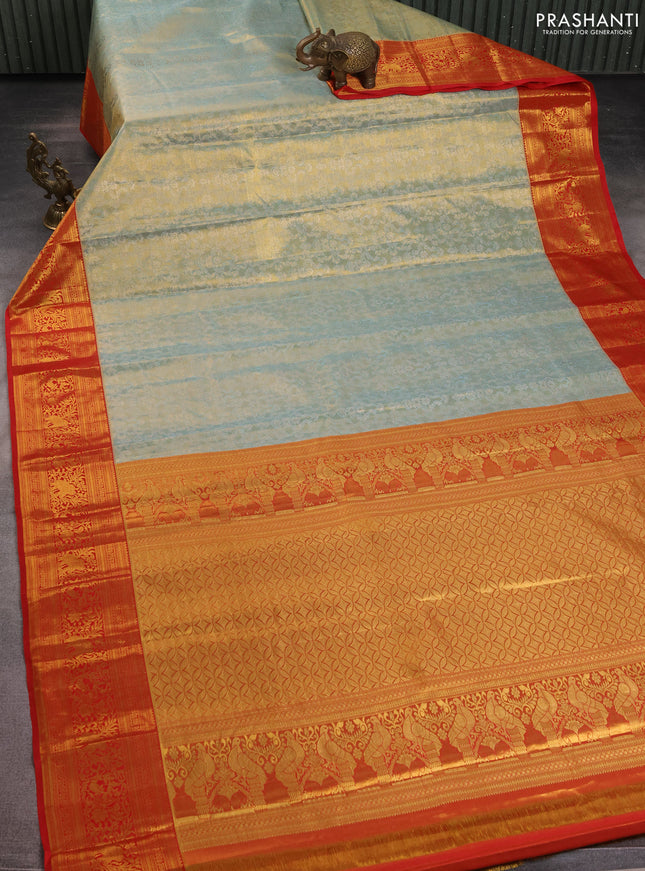 Kanchipuram tissue silk saree pastel blue and red with allover zari woven brocade weaves and zari woven border