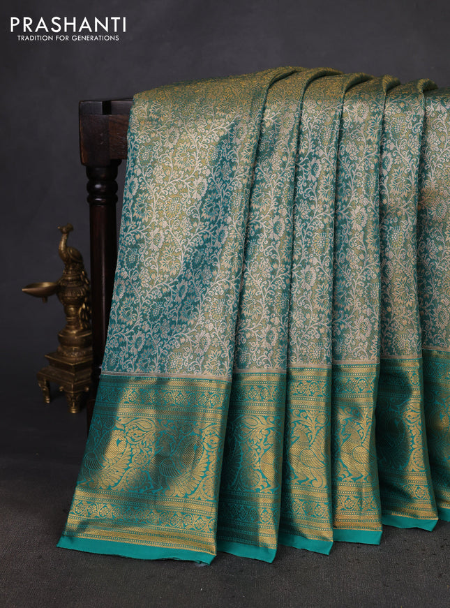 Kanchipuram tissue silk saree teal green with allover zari woven brocade weaves and zari woven border