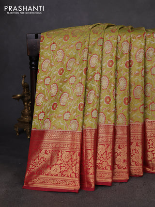 Kanchipuram silk saree light green and pink with allover zari woven brocade weaves and zari woven border