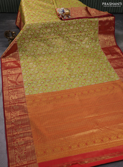 Kanchipuram silk saree light green and pink with allover zari woven brocade weaves and zari woven border